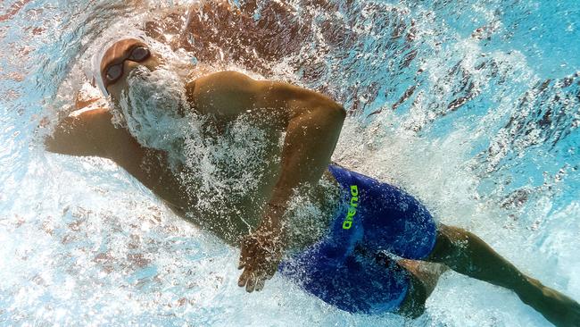 PICTURE TAKEN WITH AN UNDERWATER CAMERA - Greece's Andreas Vazaios competes in the semi-finals of the men's 200m individual medley swimming event at the 2015 FINA World Championships in Kazan on August 5, 2015. AFP PHOTO / FRANCOIS XAVIER MARIT