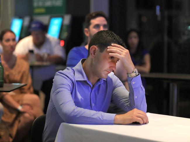 David Crisafulli monitors the vote on Saturday night. Picture: Scott Powick