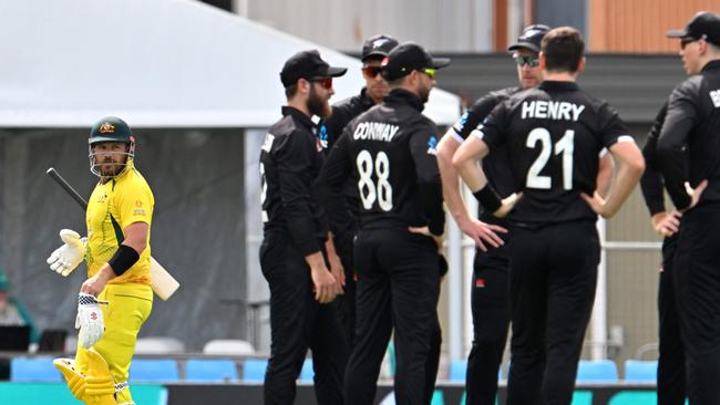 Australia's Aaron Finch (L) looks on after being dismissed cheaply against New Zealand.