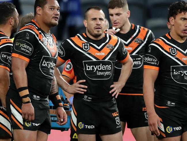 SYDNEY, AUSTRALIA - AUGUST 16:  Josh Reynolds of the Tigers looks on after a Bulldogs try during the round 14 NRL match between the Wests Tigers and the Canterbury Bulldogs at Bankwest Stadium on August 16, 2020 in Sydney, Australia. (Photo by Mark Metcalfe/Getty Images)