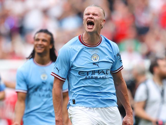 LONDON, ENGLAND - JUNE 03: Erling Haaland of Manchester City celebrates after the FA Cup final match between Manchester City and Manchester United at Wembley Stadium on June 03, 2023 in London, England. (Photo by James Gill - Danehouse/Getty Images)