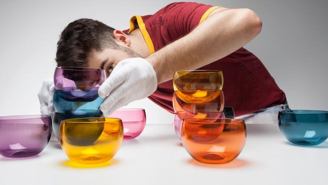 Glass artist Thomas Yeend with this Gacha bowl series. Source: Supplied