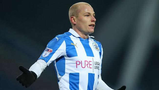 Aaron Mooy in action for Huddersfield Town.