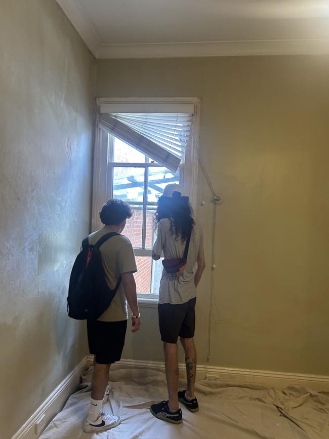 A pair of would-be renters inspecting the property. Picture: Mikaela Wilkes