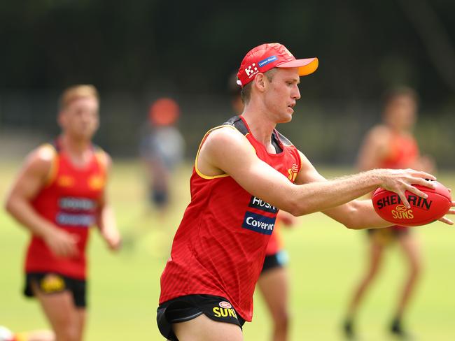 Jack Lukosius kicks during a Gold Coast Suns AFL media and training session at Metricon Stadium on November 04, 2019 in Gold Coast, Australia. (Photo by Chris Hyde/Getty Images)