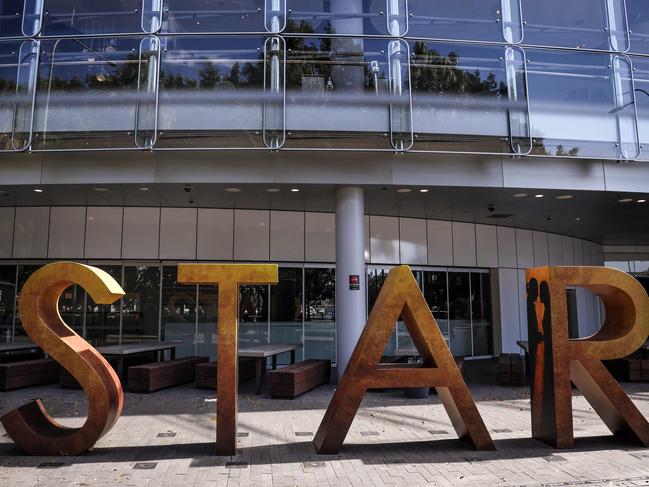 A sign stands outside The Star casino and event centre in Sydney on September 2, 2024. Troubled resort and casino operator Star Entertainment was temporarily delisted from the Australian Securities Exchange on September 2 after failing to post its annual financial results. (Photo by DAVID GRAY / AFP)