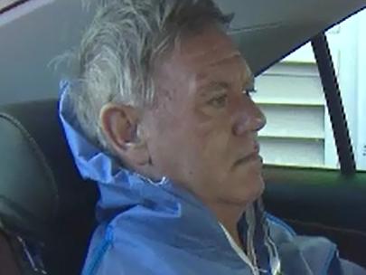 Andrew Cobby is taken into Southport Watch house and charged with the Worongary murder of his wife. Photo: 9 Gold Coast News ##MUST CREDIT MUST CREDIT##