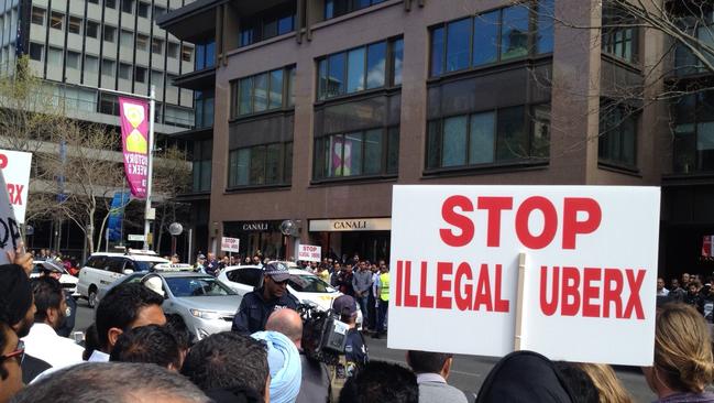 Hundreds of angry taxi drivers and owners rallied outside the NSW Parliament earlier this month calling on the state government to ban ride sharing company UberX.  Picture: Jim O'Rourke