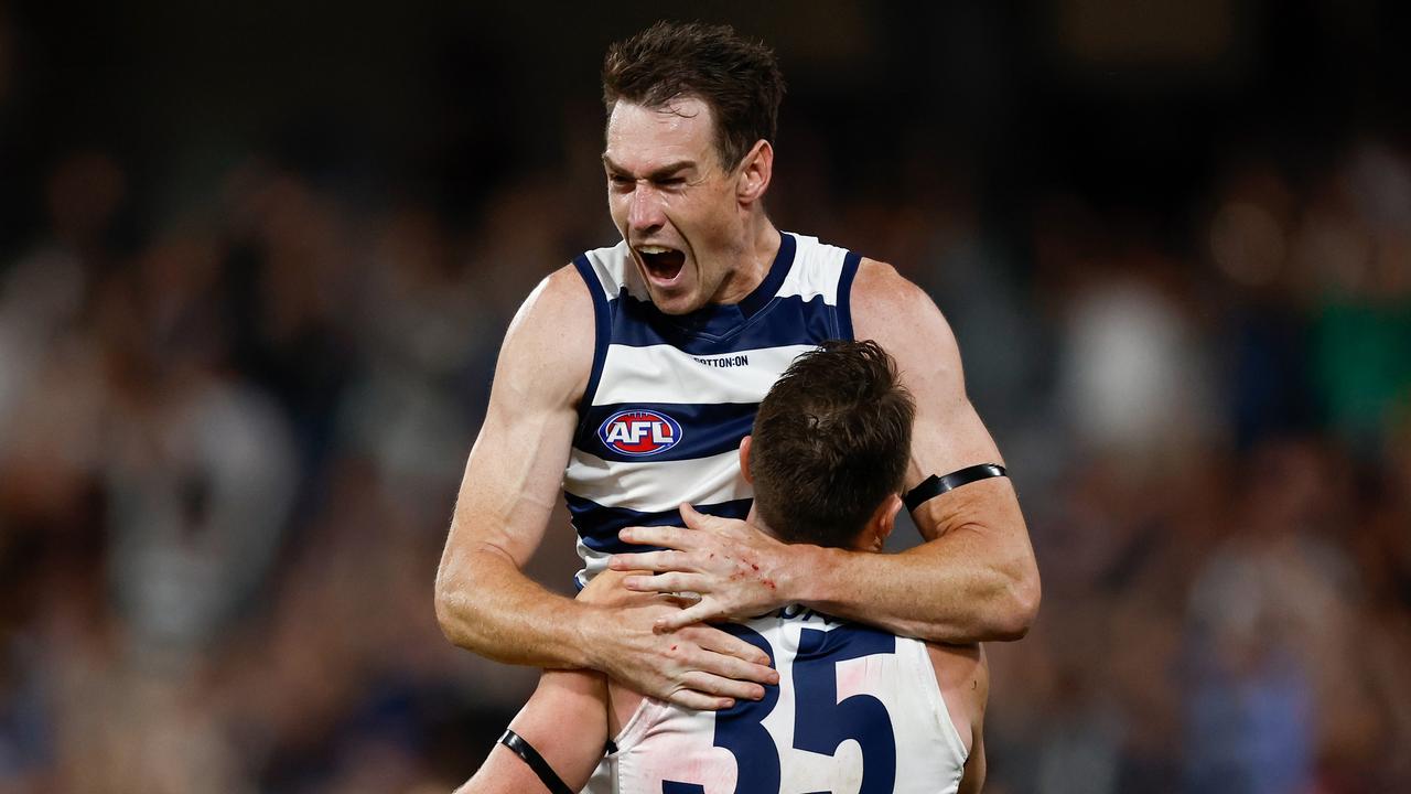 Jeremy Cameron and Patrick Dangerfield celebrate after his goal at the death. Picture: Michael Willson/AFL Photos via Getty Images