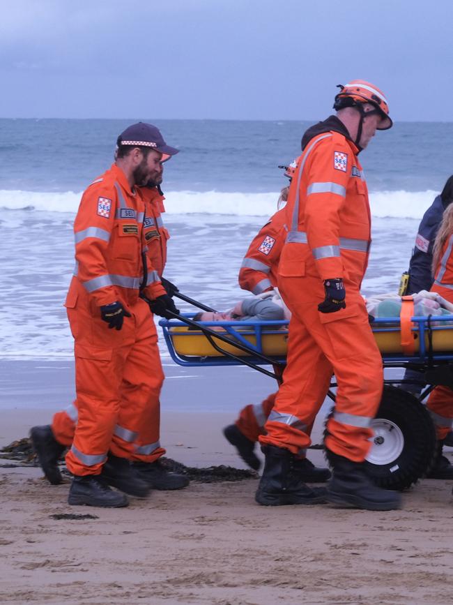 The woman’s stretcher was placed on a wheeled rescue cart. Picture: Shaun Viljoen