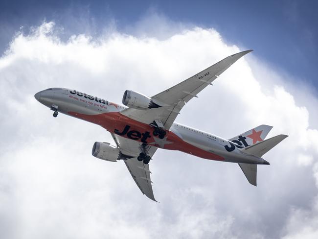 BRISBANE AUSTRALIA - NewsWire Photos SEPTEMBER 6, 2022: A Jetstar plane leaves Brisbane Airport. Hundreds of Australians are stranded in Bali after multiple Jetstar flight cancellations leave travellers scrambling to find emergency accommodation. NewsWire / Sarah Marshall