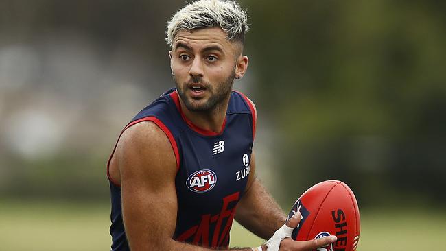 MELBOURNE, AUSTRALIA - DECEMBER 09: Christian Salem of the Demons in action during a Melbourne Demons AFL training session at Casey Fields on December 09, 2020 in Melbourne, Australia. (Photo by Daniel Pockett/Getty Images)