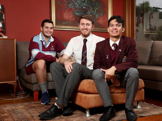 Homebush Boys High School year 12 students from left Michael Lopes, 18, Charlie McClean, 18, and Shahi Uddin, 19. Picture: Jonathan Ng