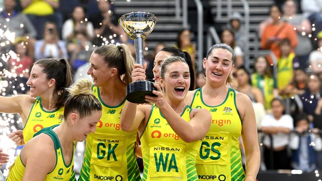 Liz Watson holds up the Constellation Cup as the Diamonds celebrate victory at the Gold Coast Convention and Exhibition Centre. Picture: Getty Images