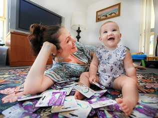 Julie Christie with daughter Liandra from Tweed Heads is the inventor of the Nail Snail, a nifty device that trims baby an infant nails with ease. Picture: Scott Powick