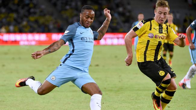 Manchester City's Raheem Sterling controls the ball.