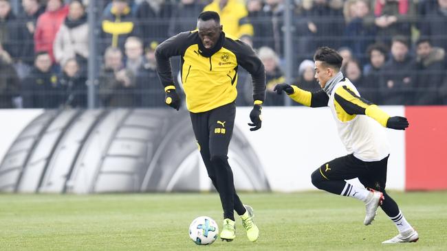 Retired sprinter Usain Bolt on the play in a training session with German club Borussia Dortmund.