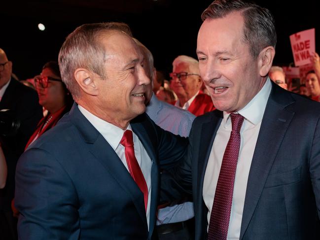 Western Australia Premier, Roger Cook (L) is greeted by former WA Premier Mark McGowan before giving a speech at the WA LaborÃ¢â¬â¢s 2025 State Election Campaign Launch in Perth, Sunday, February 23, 2025. The Western Australian State Election is scheduled to held on Saturday, March 8, 2025. (AAP Image/Richard Wainwright) NO ARCHIVING