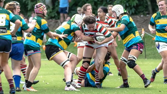 Krystal Johnston making a tackle close to her own tryline. Picture: Chris Lodge