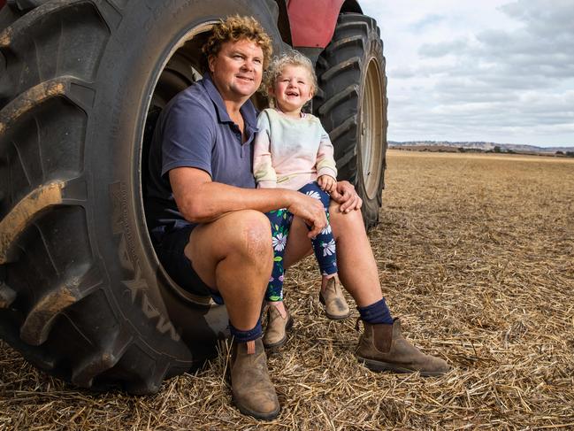 Fourth generation Riverton famer Sam Przibilla with daughter Aubree, 3, on March 23rd, 2022, at their Riverton Farm.Picture: Tom Huntley