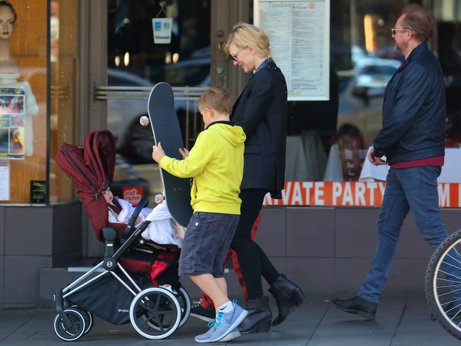 Skater boy ... Cate checks out her son’s skateboard. Picture: Snapper