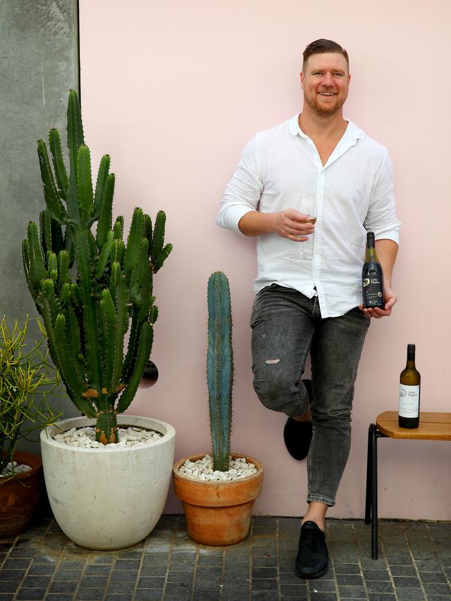 Dean Wells promotes his wine label Little Ripples. Picture: Toby Zerna