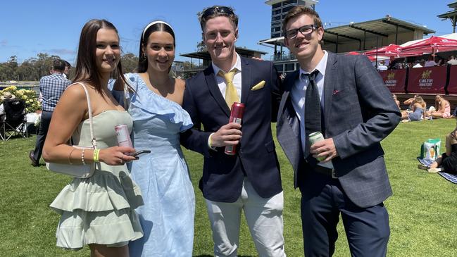 From left to right: Casey Mitchell, Elisa, Blake Barri, and Nick Osborne enjoy a stunning day at the Apiam Bendigo Cup 2023. Picture: Timothy Cox