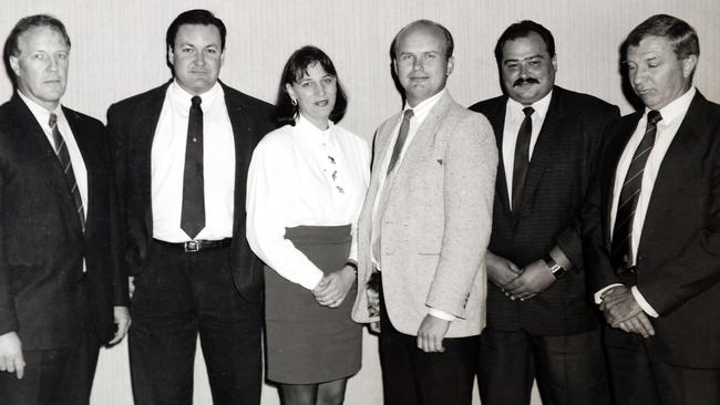 Detective Superintendent Ian Lynch, second from left, pictured with colleagues before retiring. Picture: Sam Ruttyn