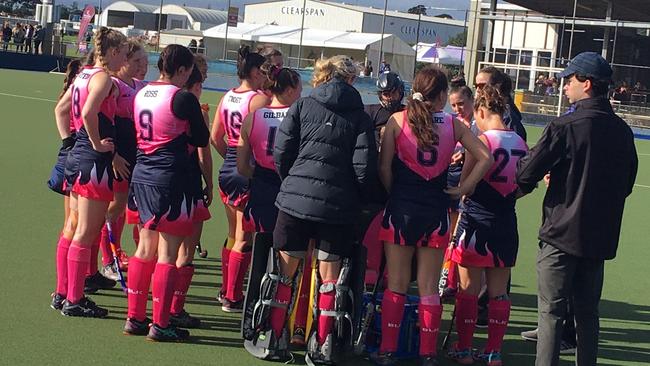 The Toowoomba 1 women in a huddle.