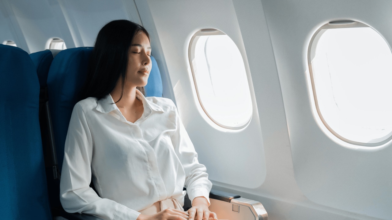 <h3><span>#1. Breath Work&nbsp;</span></h3><p><span>Breath work is the most important thing you can do on a plane. Breathing correctly not only calms your nervous system but also encourages good posture, which relieves pressure on your lower back and aligns your spine.</span></p><p><strong>How to Do It:</strong></p><ul><li><span>Sit upright with your feet flat on the floor, and evenly weigh your sitz bones.</span></li><li><span>Stack your ribcage over your pelvis, shoulders over your heart, and head over your spine.</span></li><li><span>Close your eyes and lips, and breathe slowly and naturally through your nose.</span></li><li><span>Continue for 8-10 breaths or up to 20 minutes.</span></li></ul>