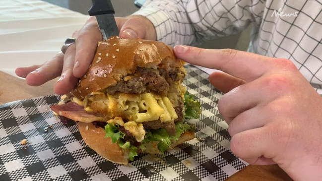 Daily Telegraph reporter Mitchell Van Homrigh takes 11 of Australia's best burgers for a test drive!