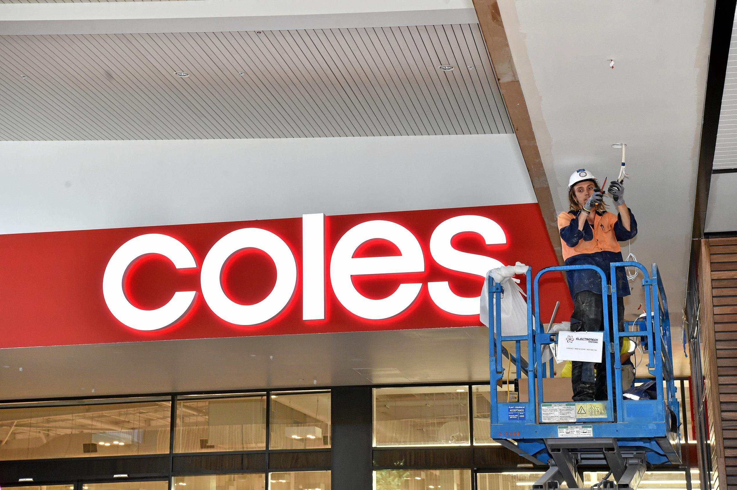 Full steam ahead for the opening of the Stockland Birtinya Shopping Centre. Constuction workers put the final pieces together for the grand opening in a couple of weeks. Picture: Warren Lynam