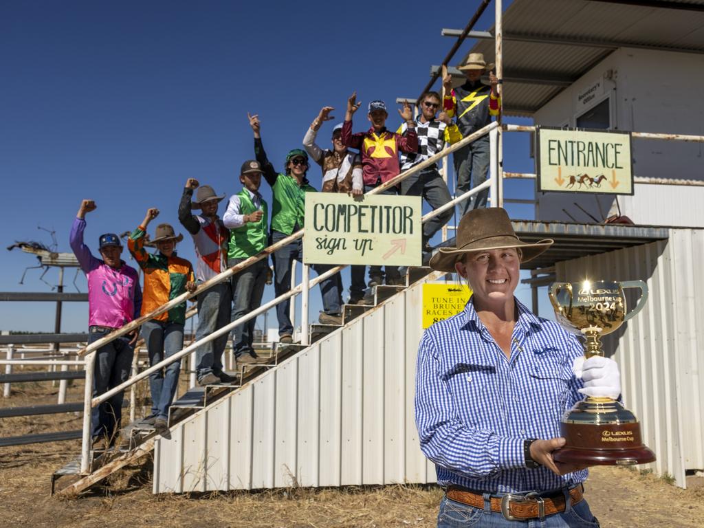 ABC Amateur Race Club president Mary (Brumby) Vaughan and the local community with the Lexus Melbourne Cup trophy at Brunette Downs station in the NT. Picture: Alex Coppel