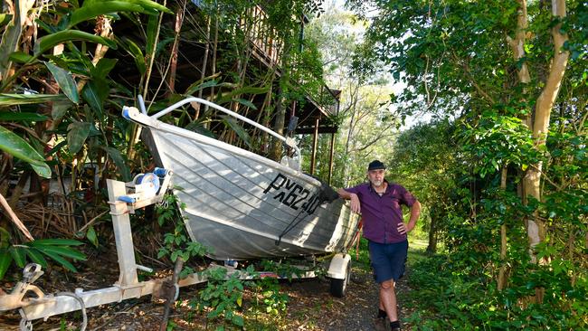 Aiden Ricketts of North Lismore was swamped in the 2022 February/March flood disaster. He has cleaned up his home and intends to stay – his escape plan includes a fixed ladder from his back veranda and his trusty tinny. Picture: Cath Piltz