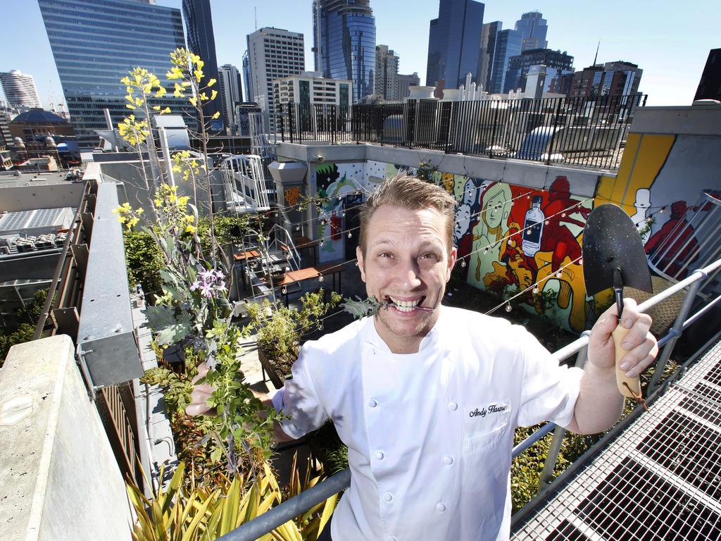 Executive chef Andy Harmer in QT Melbourne’s rooftop garden, which grows produce that is then used in the venue's kitchen. Picture: David Caird