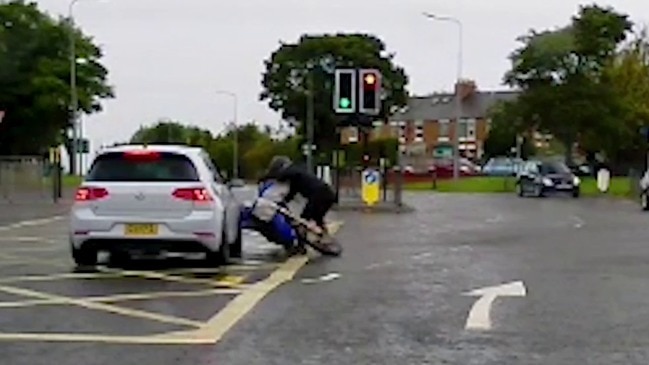 Dashcam Footage Shows Motorbike Crashing Into Car in Durham, England