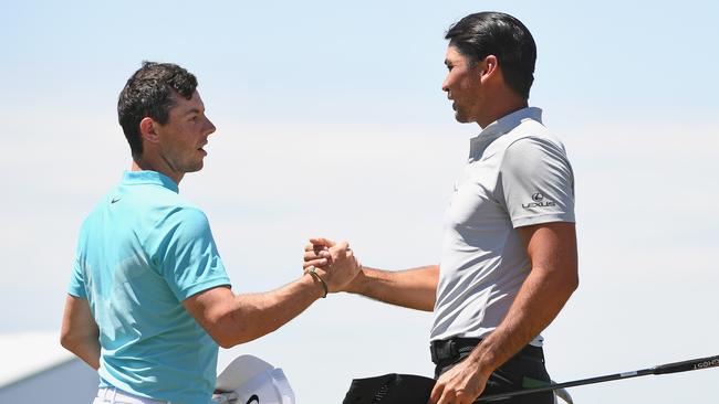 Rory McIlroy and Jason Day shake hands during the US Open.