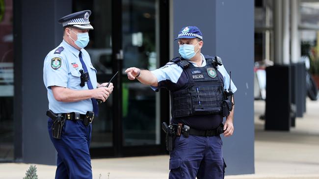 Police and Fire fighters at the border manage disgruntled border crossers. Picture: NIGEL HALLETT