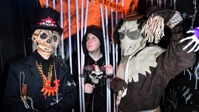 Elliot Brown (left, in skull mask), James Postle and Mark Postle (right, in scarecrow costume). Picture: John Gass