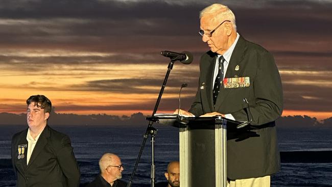 Surfers Paradise Anzac Day dawn service guest speaker Major John Thurgar on the beachfront.