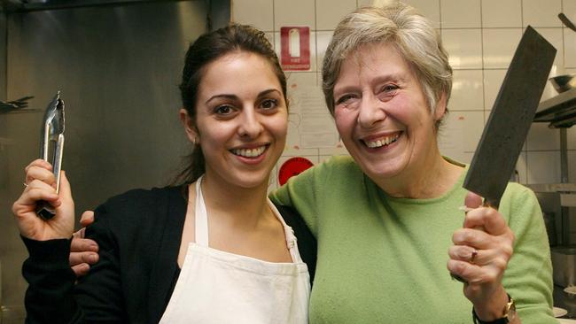 Food writer Rita Erlich (right) has been collecting Melbourne restaurant menus since the 1980s. Picture: HWT Library.