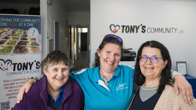 Jenn Belford (centre) thanks Tony's Community Kitchen directors Alison Hunter and Jo Noonan (right) as the charity opens in a new James Street address. Picture: Kevin Farmer