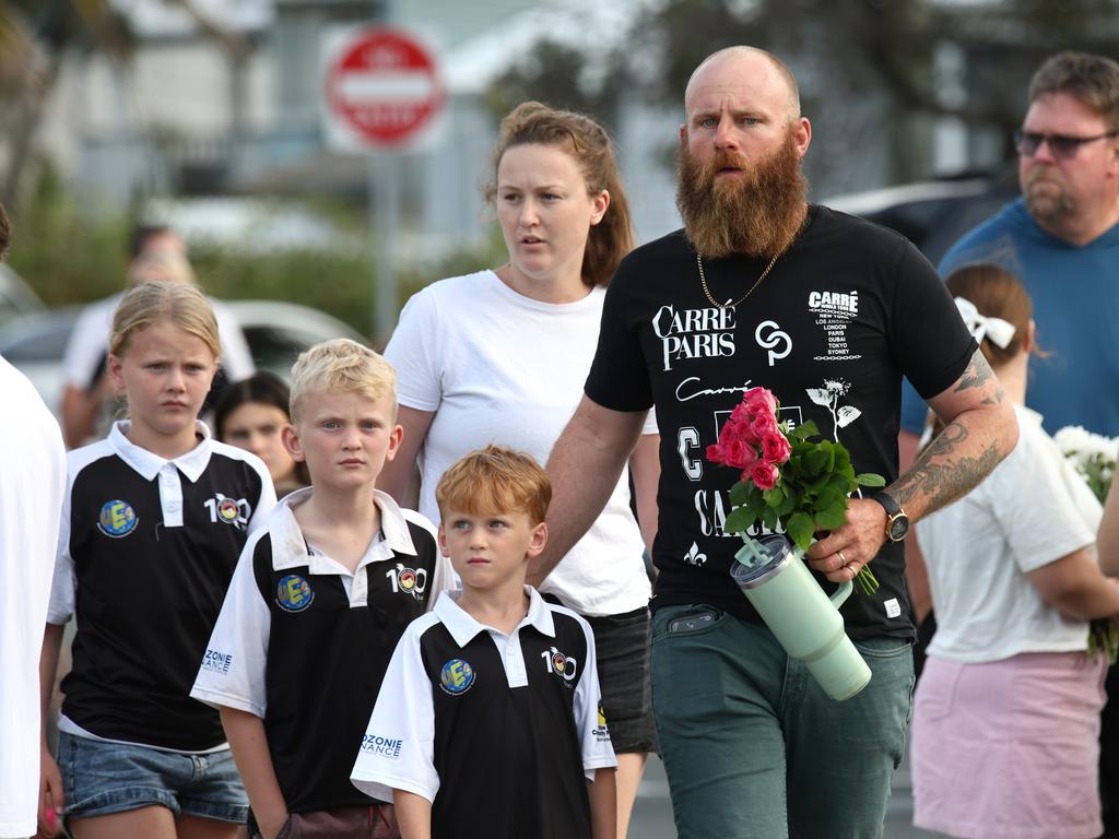 Hundreds of people have gathered at Bribie Island for a vigil to honour 17-year-old shark attack victim Charlize Zmuda. Picture: David Clark