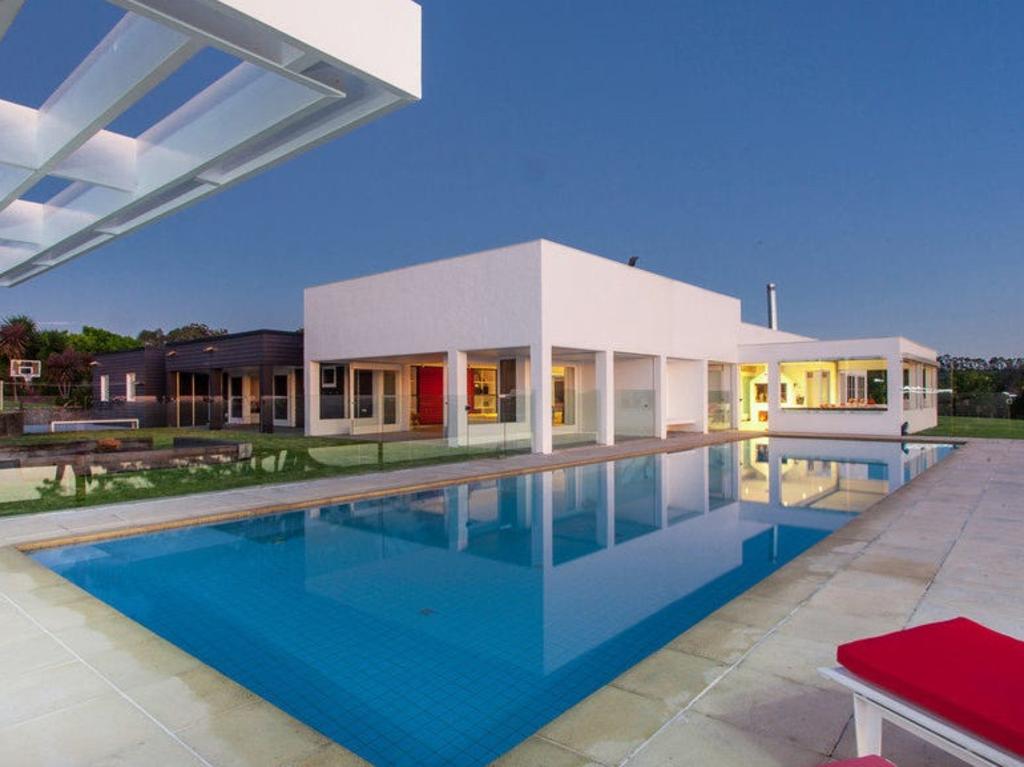 The swimsuit-clad singles can laze around the 18m in-ground swimming pool under the Byron sun. Picture: Supplied