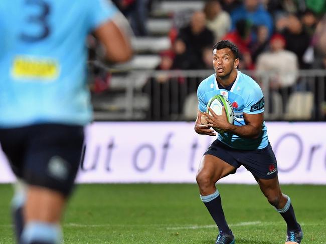 Kurtley Beale of the Waratahs charges forward at AMI Stadium in Christchurch.