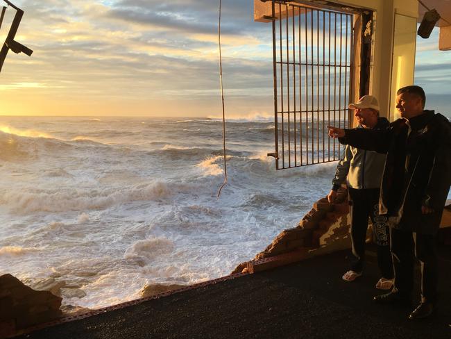 The inside of Coogee Surf Life Saving Club is pictured battered following massive storms across the NSW east coast.