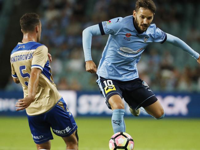 Sydney FC Milos Ninkovic fights for the ball with Newcastle’s Ben Kantarovski. Picture:Getty Images