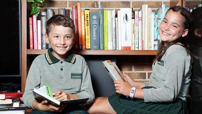 Mum of Erskineville Public School students Hugo, 7, and Nadia Hammond, 10 said she wants them to read rather than listen to books. Picture: Tim Hunter