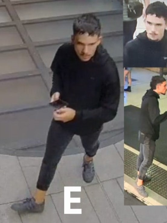 The fifth man (Person E) is described as being of Caucasian appearance, of thin build with short black hair. He is depicted wearing black trackpants, a black jumper, grey shoes and was wearing a black bandana over his face. Picture: NSW Police