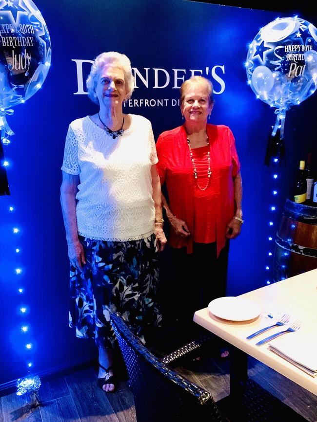 Twins Pat Wilson of Cairns and Judy Taylor from the Gold Coast with their personalised balloons, celebrating their birthday on Saturday, July 11.